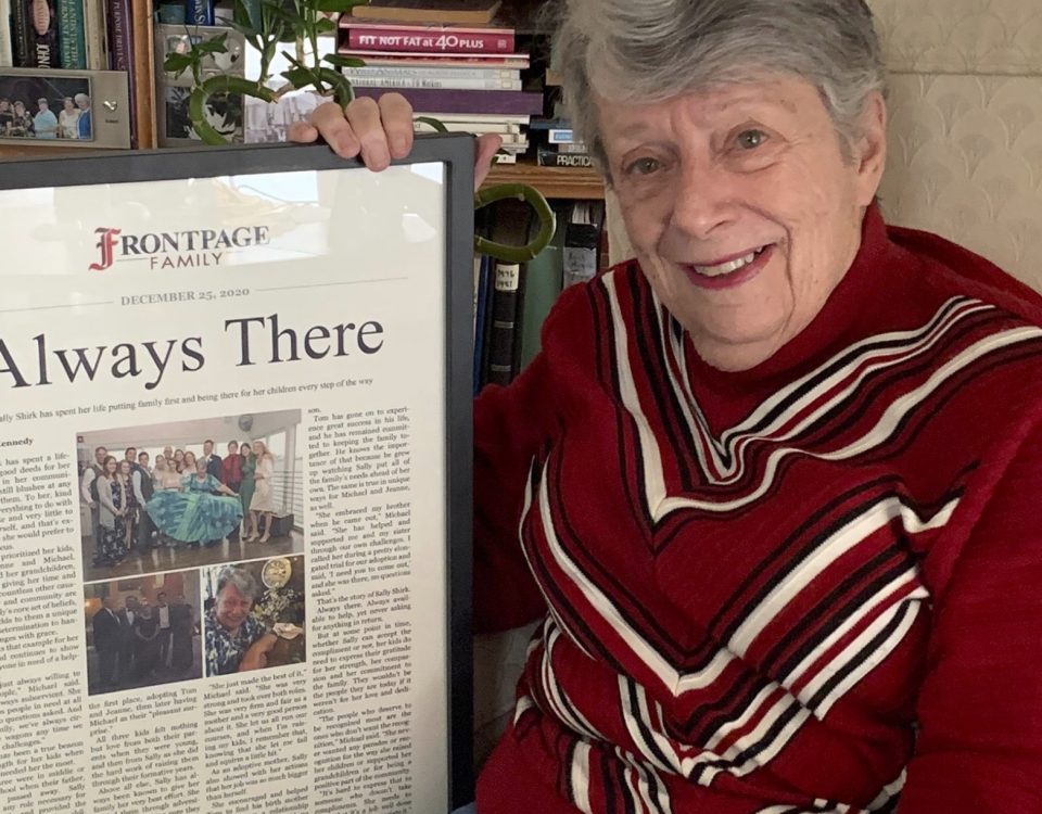 Mom smiling with personalized newspaper story (basic)