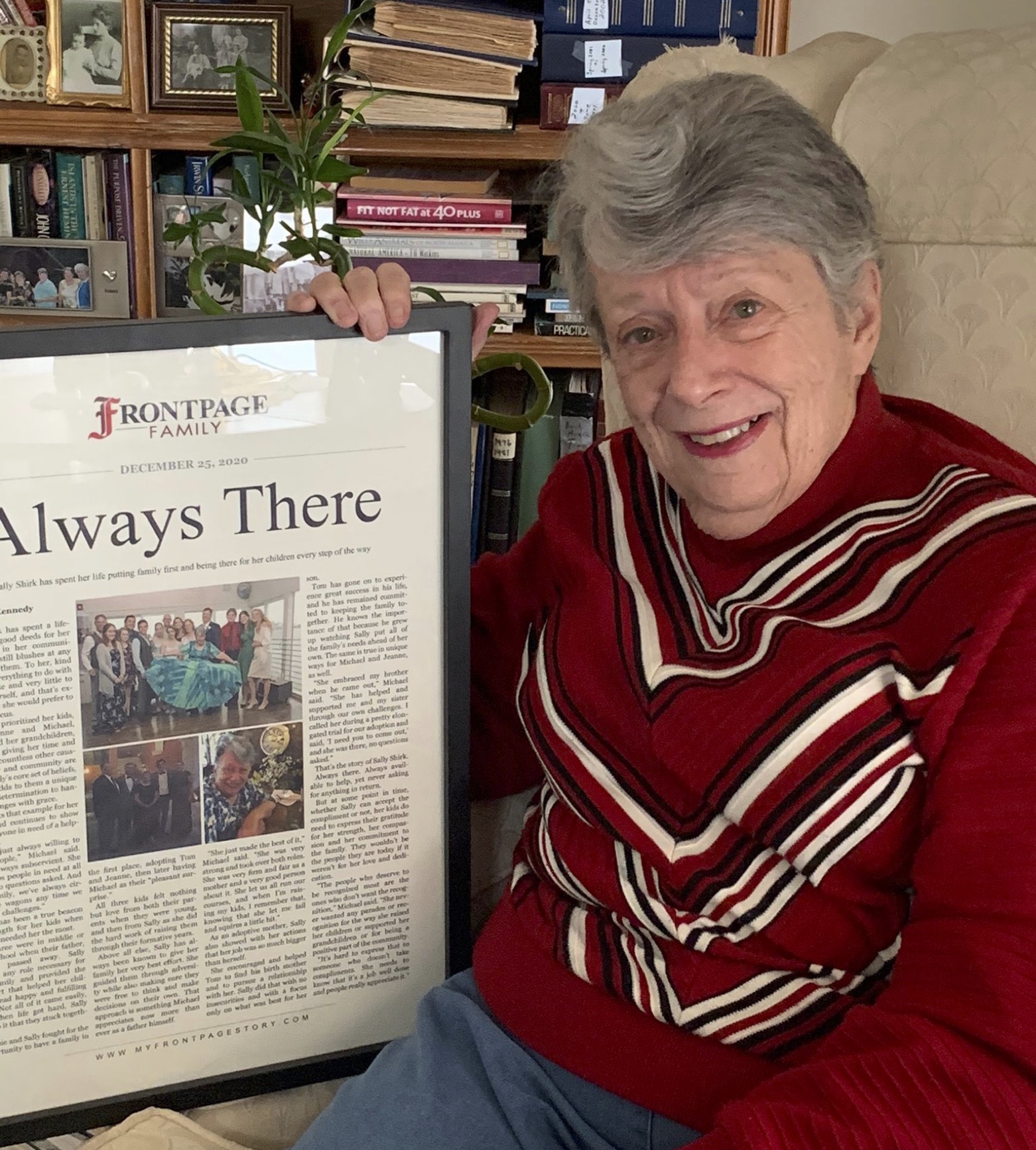 Mom smiling with personalized newspaper story (basic)