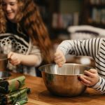 son cooking with Mom in the kitchen - a unique Mother's Day gift