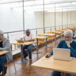 Elderly People Using Laptop Computers